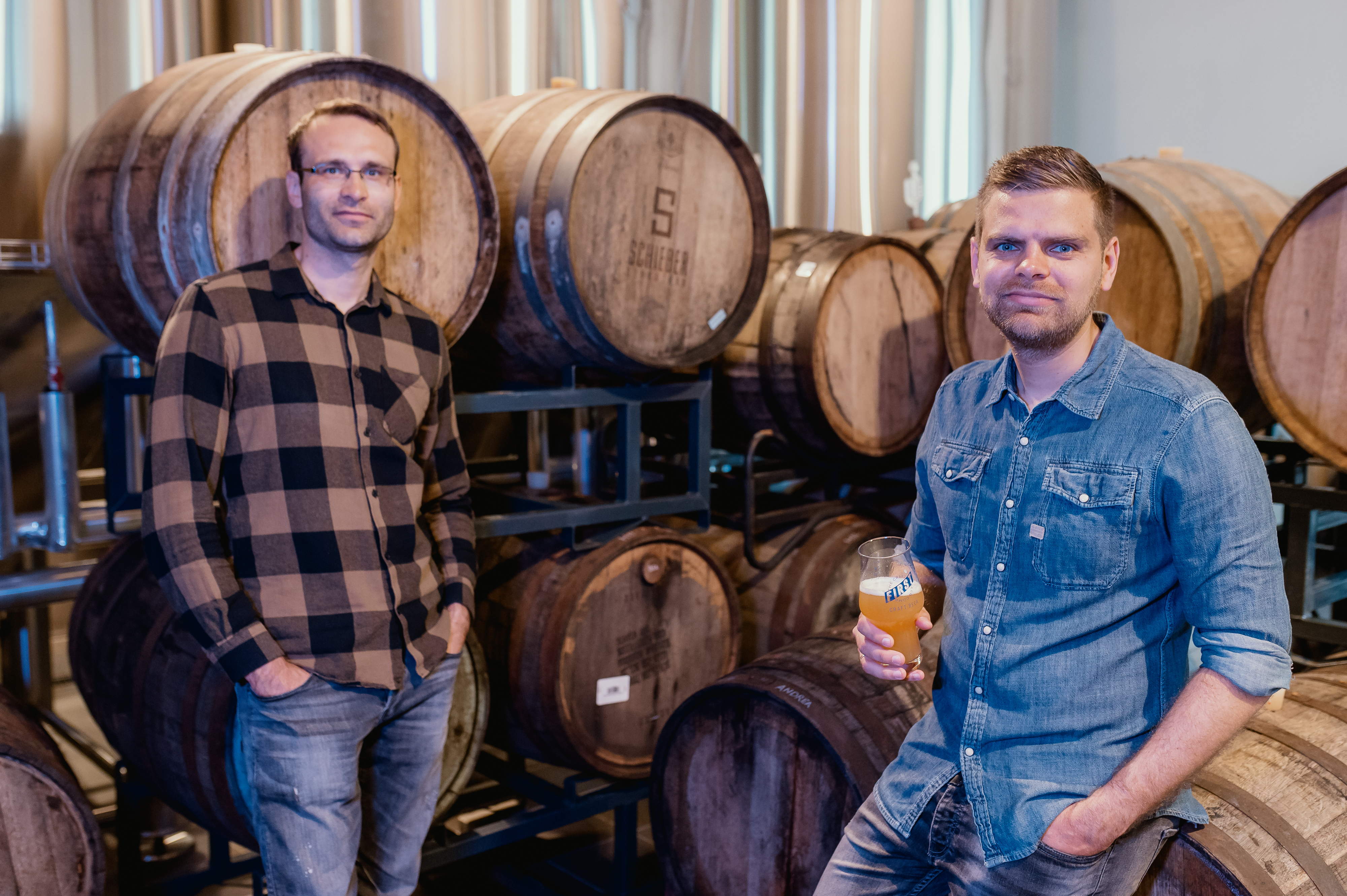 brewery-brewerys-standing-over-barrelaged-beers